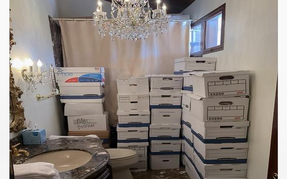 Boxes of records are seen in a bathroom and shower in the Lake Room at former President Donald Trump's Mar-a-Lago estate in Palm Beach, Fla.