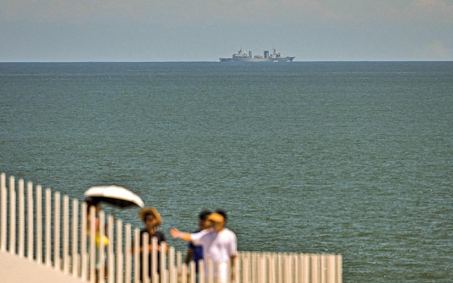 A Chinese military vessel sails off Pingtan island, one of mainland China’s closest points from Taiwan, in Fujian province on Aug. 5, 2022. 