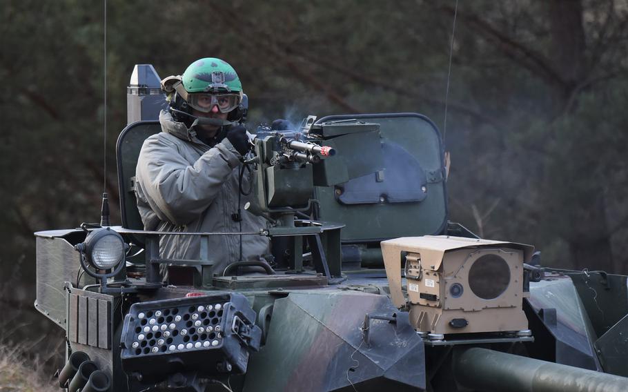 Enemy vehicles simulate fire on the 2nd Cavalry Regiments ground soldiers during ambush training, as part of exercise Dragoon Ready on Jan. 29, 2023, at the Joint Multinational Readiness Center in Hohenfels, Germany.