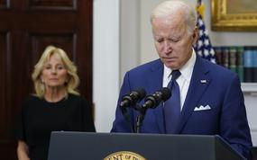 President Joe Biden pauses as he speaks about the mass shooting at Robb Elementary School in Uvalde, Texas, from the Roosevelt Room at the White House, in Washington, May 24, 2022, as first lady Jill Biden listens. 