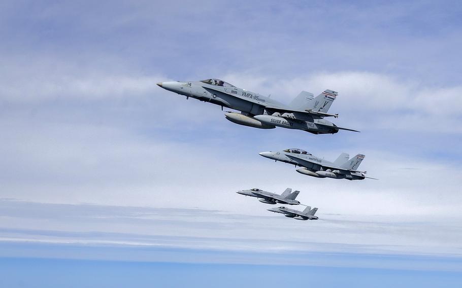 U.S. Marine Fighter Attack Squadron 115 pilots fly alongside Finnish air force Fighter Squadron 31 jets over Rissala Air Base, near Kuopio, Finland, June 18, 2021. Finland announced May 12, 2022, its intent to join NATO. 