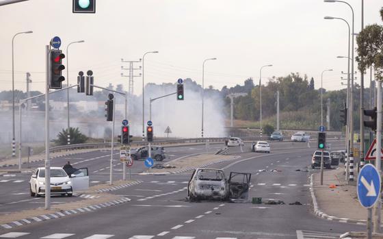 A car destroyed by Palestinian militants in Sderot, Israel, on Oct. 7. MUST CREDIT: Bloomberg photo by Kobi Wolf