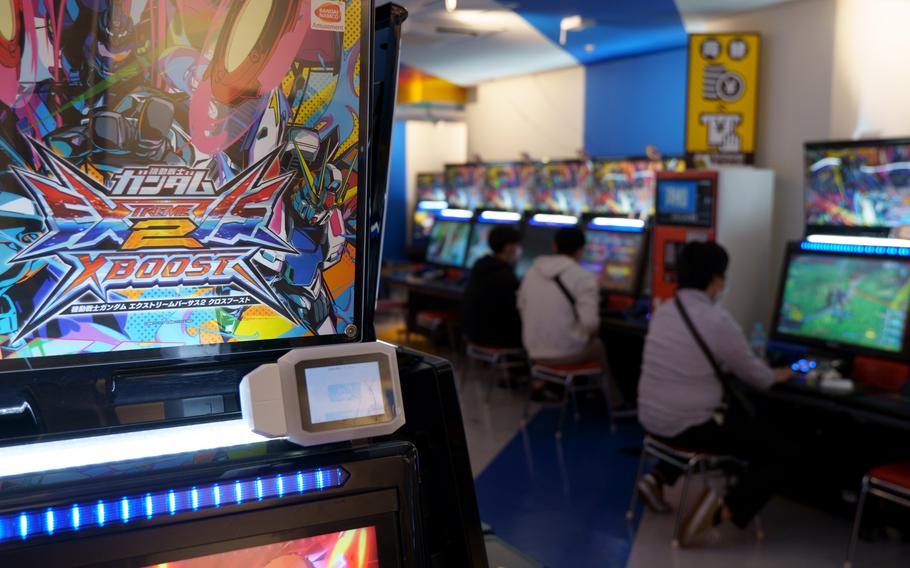 In Namco Akihabara's basement you’ll find just over 40 stations for a popular Gundam-themed fighting game.