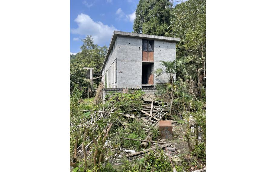 One of two blockhouses where civets were raised at Lichuan Juyuanxiang Special Breeding Cooperative, in Longtang village, Enshi prefecture, China, seen on Sept. 13. The farm's website claimed it was the "largest" civet farm in Hubei province before authorities shut it down. 