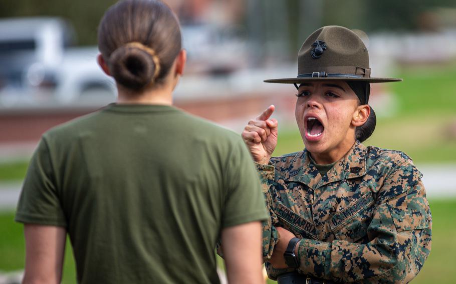 A training instructor addresses a recruit with Papa Company, 4th Recruit Training Battalion, at Marine Corps Recruit Depot Parris Island, S.C., on Dec. 14, 2022. The unit, which was once all-women but has included men in recent years, will be deactivated in June.