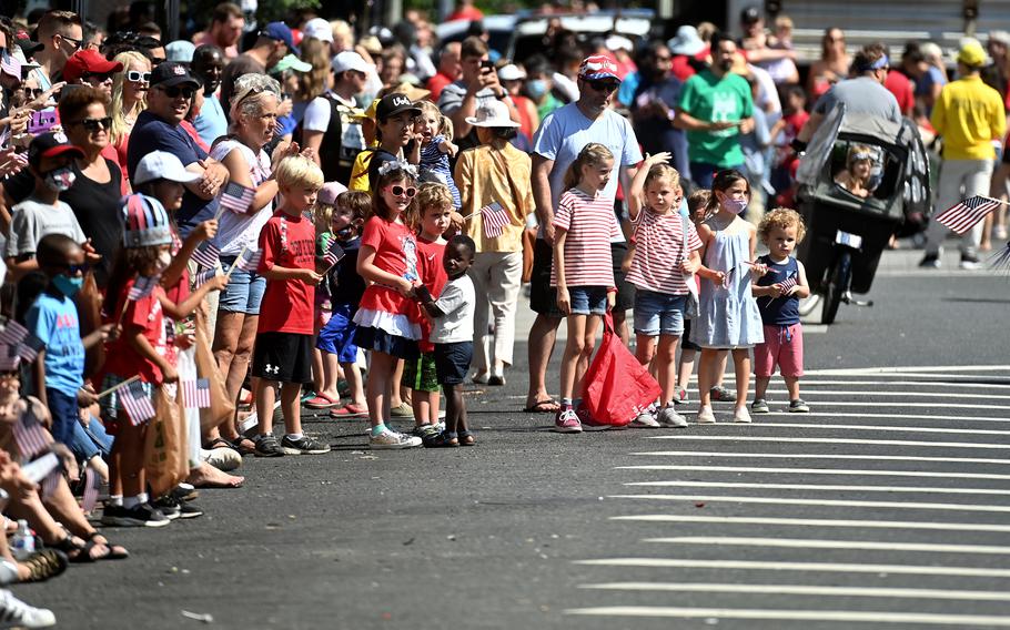 Spectators enjoy the Barracks Row Parade celebrating Independence Day in Washington, D.C., on July 4, 2021. 