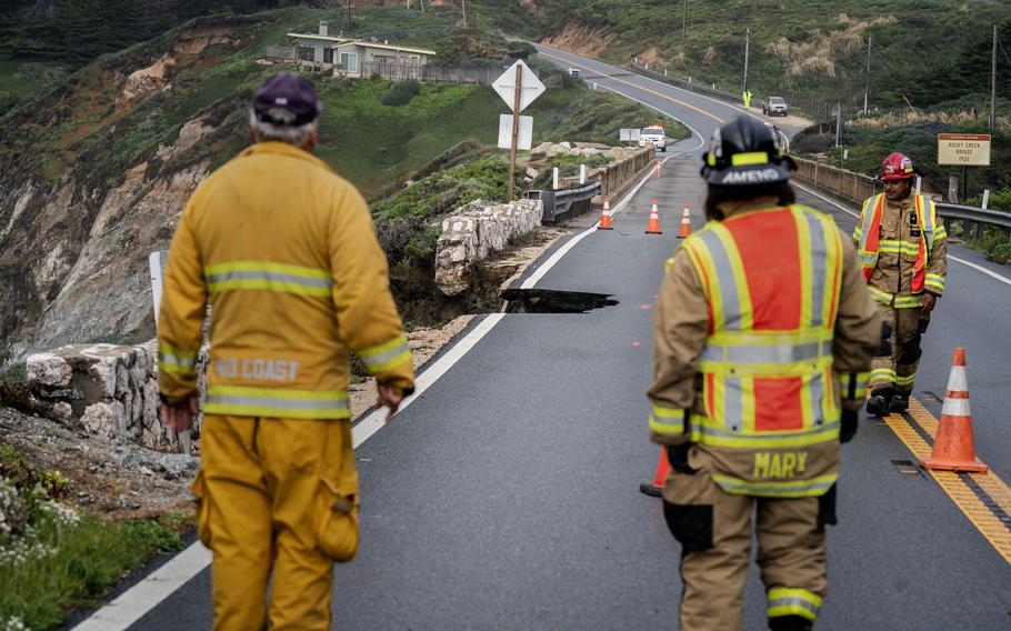 Crews were working to stabilize the edge of the roadway, said Caltrans, which asked people to “avoid all unnecessary travel” in the area.