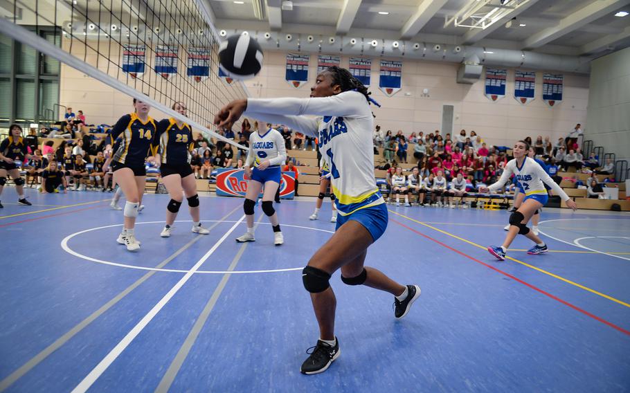 Rickalia Goss of the Sigonella Jaguars lunges for the ball while battling the Ansbach Cougars during the 2022 DODEA-Europe Volleyball Tournament Division III championship game Oct. 29, 2022, at Ramstein Air Base, Germany.