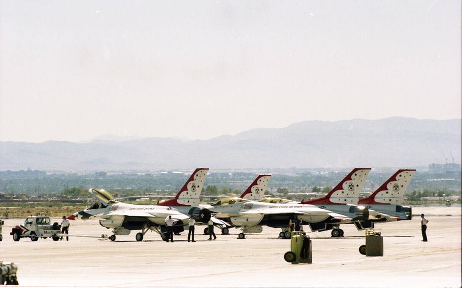 Nellis Air Force Base on Sept. 22, 1997, where pilots and support staff were observing a 24-hour stand-down, or the cancellation of all training flights, because of six military aircraft crashes in seven days. All bases around the nation with Air Combat Commands were observing the stand-down. Personnel spent the day reviewing safety protocols aimed at preventing accidents. At Nellis is the 57th Air Combat Command, which includes the USAF Weapons School, the service's largest helicopter rescue squadron, and the USAF Thunderbirds Air Demonstration Squadron. 
