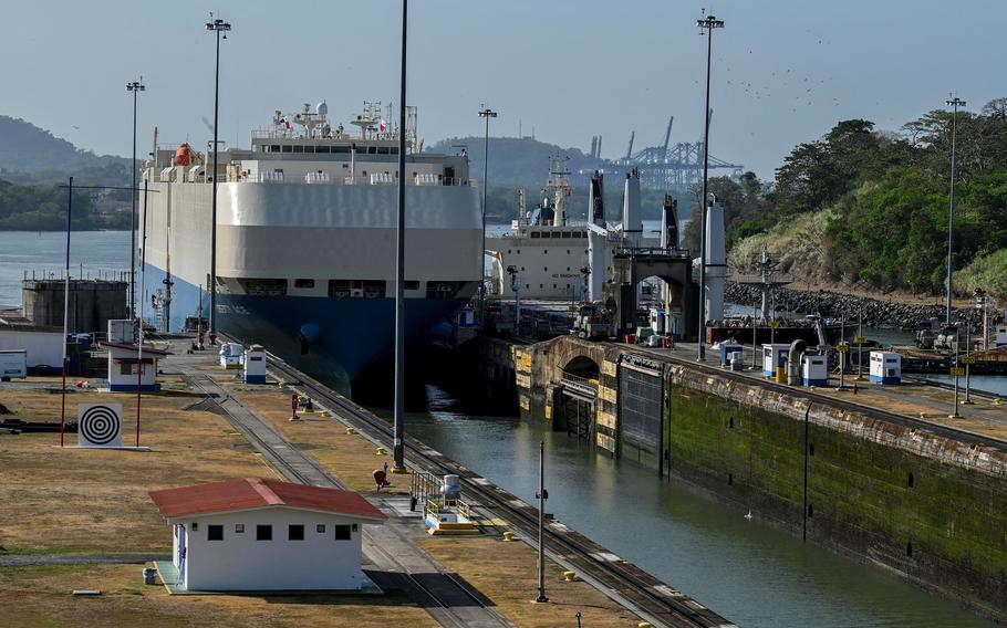 A ship is guided through the Panama Canal’s Miraflores locks near Panama City on April 24, 2023. The scarcity of rainfall due to global warming has forced the Panama Canal to reduce the draft of ships passing through the interoceanic waterway, in the midst of a water supply crisis that threatens the future of this maritime route.