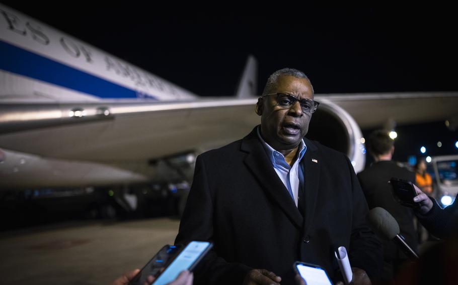 Defense Secretary Lloyd Austin addresses reporters upon arrival in Brussels, Belgium, on Feb. 13, 2023. Austin met with members of the Ukraine Defense Contact Group in Brussels and the NATO Defense Ministerial before moving on to Estonia and Germany to meet with local leaders and U.S. and allied service members. 