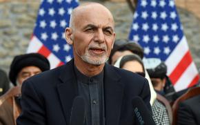 Then-Afghan President Ashraf Ghani speaks at a ceremony in Kabul on Feb. 29, 2020. Allegations that Ghani took millions of dollars with him when he fled the country in 2021 are most likely exaggerated, although some money was taken, a report released by Special Inspector General for Afghanistan Reconstruction said.