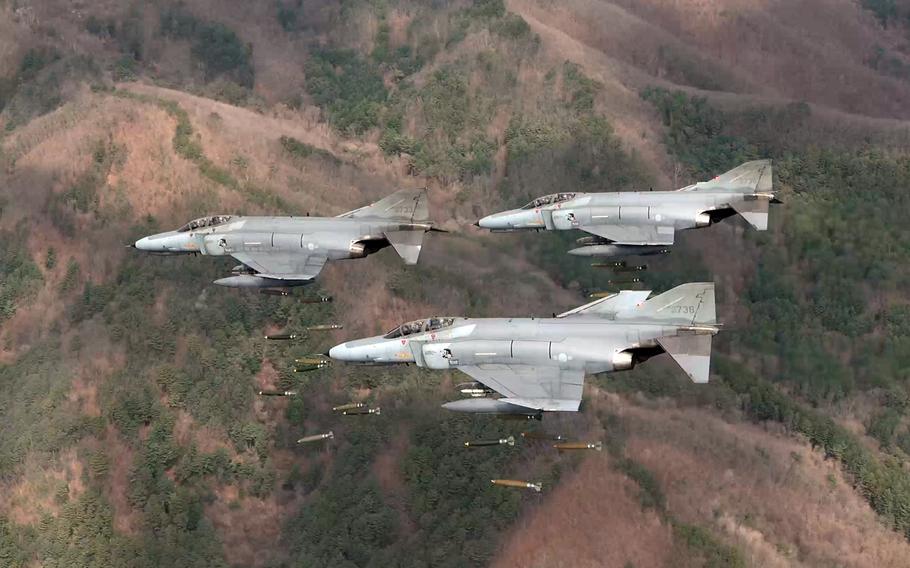 South Korean air force F-4 Phantom IIs drop 500-pound MK-82 free-fall bombs at an unspecific training site in South Korea, April 4, 2024. 