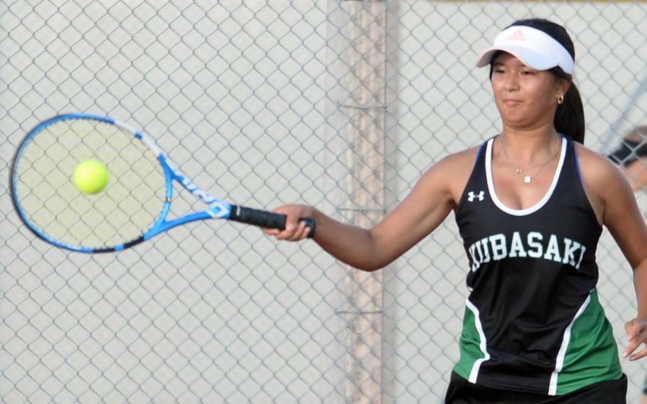Kubasaki's Noemi Ung hits a forehand return during Thursday's Okinawa doubles tennis matches. Ung teamed with Josh Wall to beat Kadena's Bryce Federico and Lauren Ewing 6-0 in mixed doubles, and the Dragons as a team beat the Panthers 10-0.