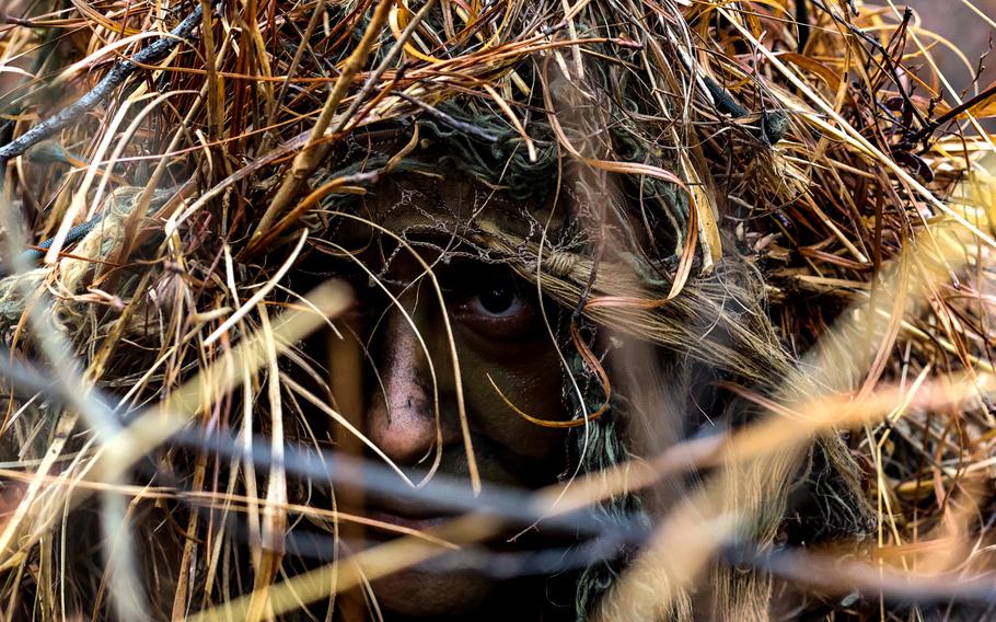 A soldier during stalking training at sniper school at then-Fort Benning, now Fort Moore, Ga., in January 2023. Sgt. Maciel Hay, a cavalry scout with 1st Squadron, 91st Cavalry Regiment, 173rd Airborne Brigade, recently became the first active-duty female U.S. Army sniper, following graduation from sniper school.