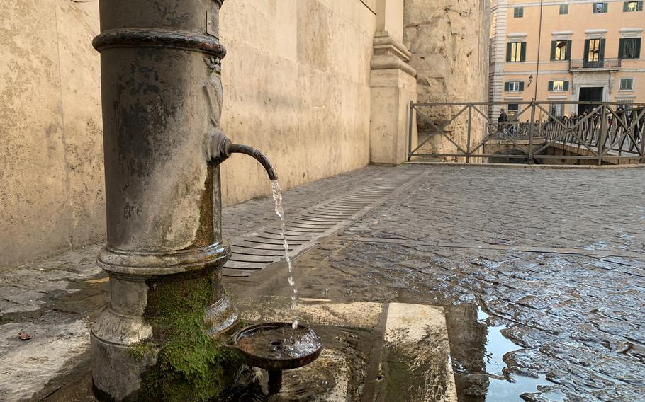 Public water fountains, such as this one in front of Rome's Hadrianeum, offer fresh, clean drinking water to passersby. There are more than 2,500 of the fountains, called nasoni, in the city. 