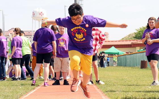 A student-athlete participates in the long-jump during the Unified Special Olympics at Camp Humphreys, South Korea, May 3, 2023.