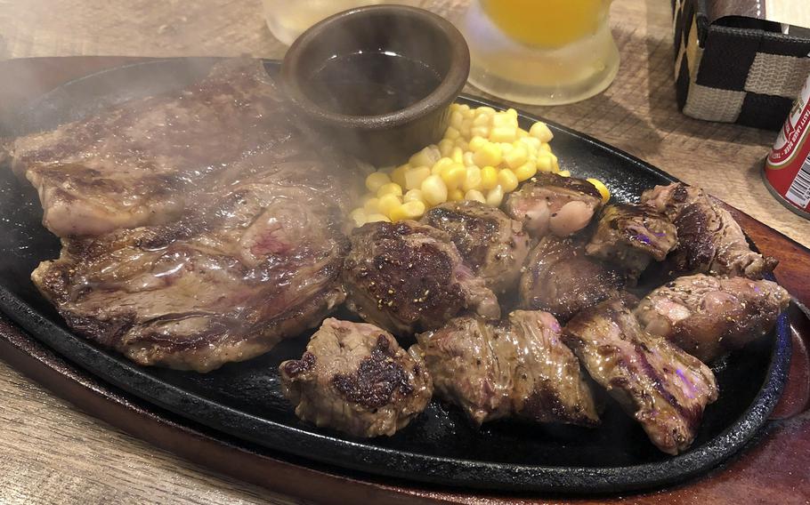 The large Ajimori set from Steak Man near Yokota Air Base, Japan, includes a chuck eye steak and diced prime rib steak with corn.