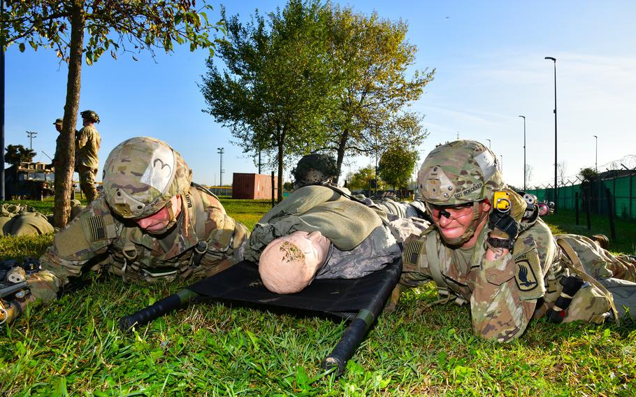 U.S. Army paratroopers from the 173rd Airborne Brigade test their medical skills during the weeklong Expert Infantryman Badge, Expert Soldier Badge and Expert Field Medical Badge training at Caserma Del Din, Vicenza, Italy, Oct. 28, 2022. 