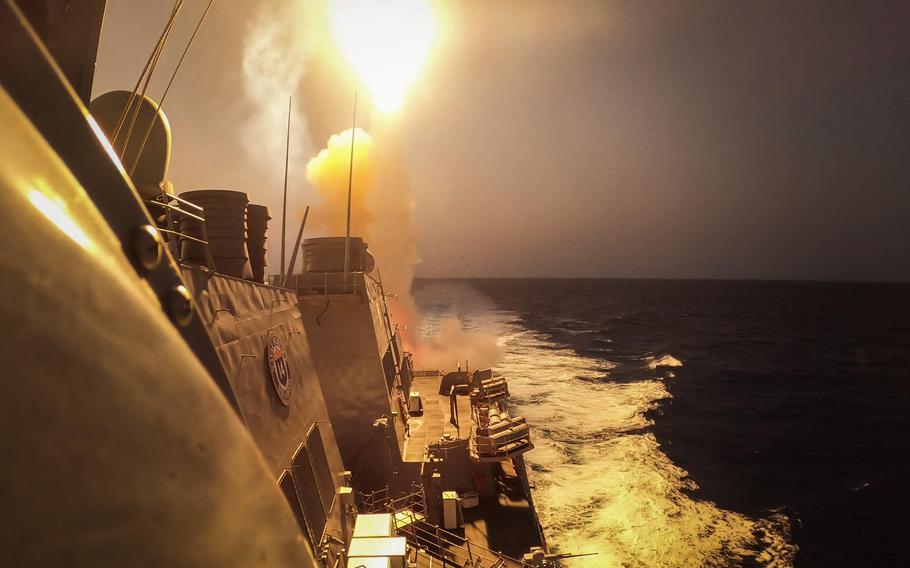 The destroyer USS Carney defeats a combination of Houthi missiles and aerial drones in the Red Sea on Oct. 19, 2023. A network of people and businesses that the U.S. says provides support to the Houthis in Yemen was hit with sanctions Thursday.
