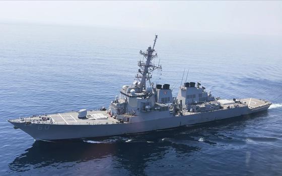 The USS Paul Hamilton is seen after passing through the Strait of Hormuz Friday, May 19, 2023. The Mideast-based chiefs of the U.S., British and French navies transited the Strait of Hormuz on Friday aboard an American warship, a sign of their unified approach to keep the crucial waterway open after Iran seized two oil tankers. (AP Photo/Jon Gambrell)