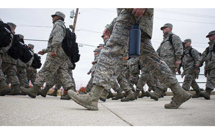 U.S. Air Force military basic training trainees march in formation Oct. 23, 2018, at Joint Base San Antonio-Lackland, Texas. 