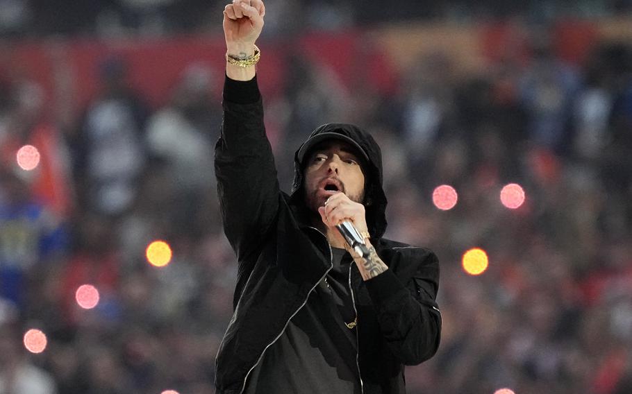 Eminem performs during halftime of the NFL Super Bowl 56 football game between the Los Angeles Rams and the Cincinnati Bengals, on Feb. 13, 2022, in Inglewood, Calif. The rapper has been inducted into the Rock & Roll Hall of Fame. 