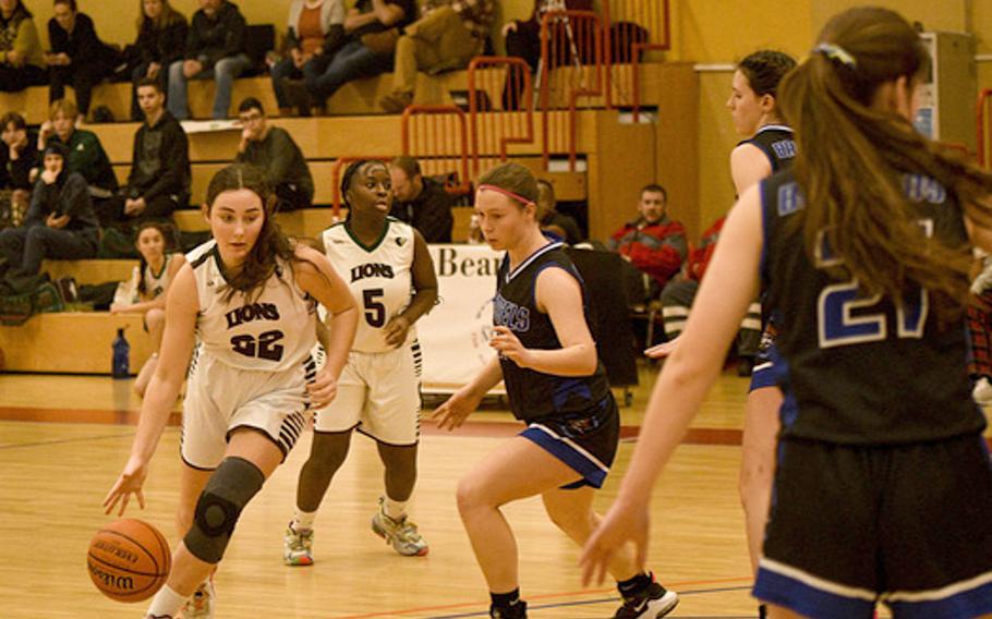 AFNORTH’s Paula Bohlen drives to the center of the floor during a DODEA-Europe Division III basketball semifinal game Feb. 17, 2023, in Baumholder, Germany.