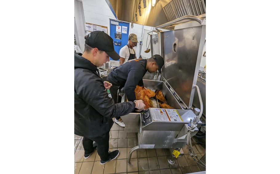 Culinary specialists in the 10th Mountain Division at Fort Drum, N.Y., prepare a Thanksgiving meal for soldiers and family members, Tuesday, Nov. 21, 2023.