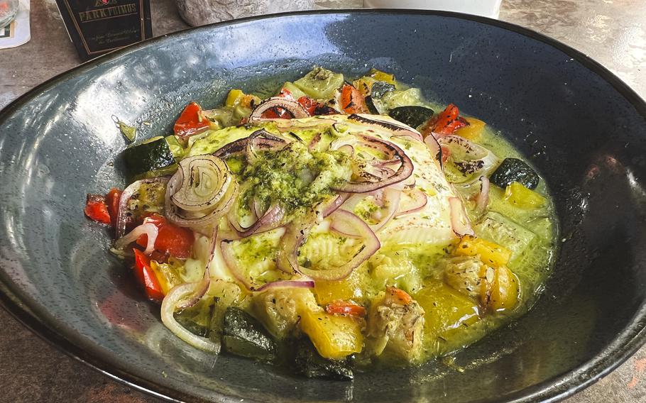 Grilled Hirtenkäse, feta accompanied by a colorful array of summer vegetables and pesto, offers a satisfying start to a meal at Zum Landgrafen in Ludwigswinkel, Germany, on Aug. 17, 2024.