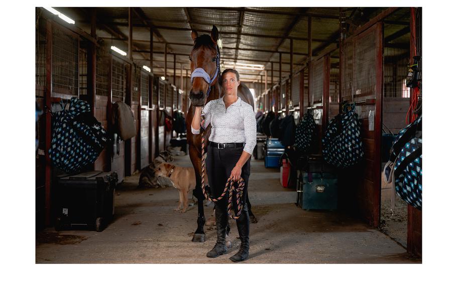 Ellen Doughty stands with Breakin’ All the Rules, a bay mare, after riding at Rockwall Hills Equestrian Center.