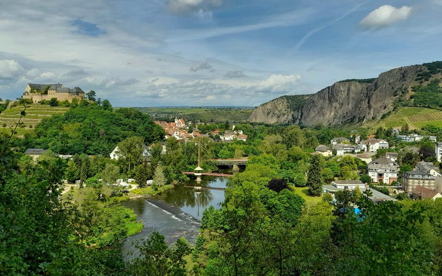 A sweeping view of Bad Muenster am Stein-Ebernburg and the Nahe River opens up by the ruins of Rheingrafenstein Castle.