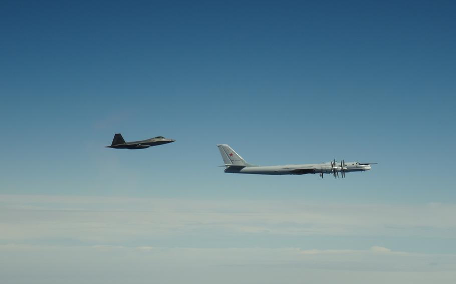 An F-22 Raptor assigned to Joint Base Elmendorf-Richardson, Alaska, intercepts a Russian Tu-95 Bear on June 9, 2020.