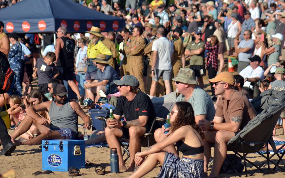 Thousands pack Mindil Beach in Darwin, Australia, to watch an airshow featuring U.S. Marine Corps and Royal Australian Air Force warplanes, Thursday, Aug. 25, 2022. 