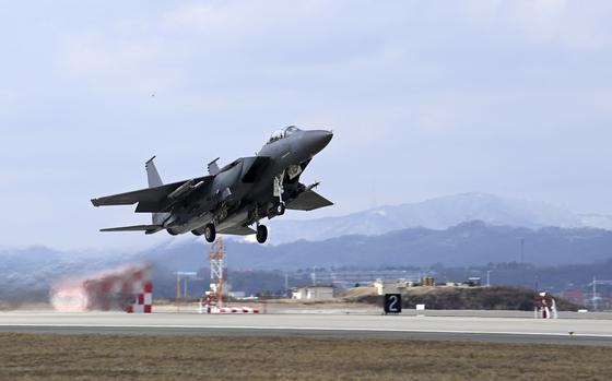 In this photo provided by the South Korea Defense Ministry, a South Korean Air Force F-15K fighter jet takes off from a South Korean Air Force base in Cheongju, South Korea, Friday, Feb. 23, 2024.