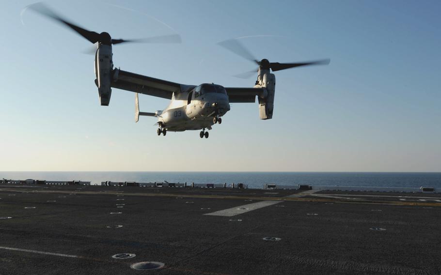 An MV-22 Osprey lands on the flight deck of the amphibious assault ship USS Bataan on Oct. 29, 2013. 