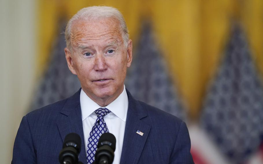 President Joe Biden answers questions from members of the media as he speaks about the evacuation of American citizens, their families, SIV applicants and vulnerable Afghans in the East Room of the White House, Friday, Aug. 20, 2021, in Washington.