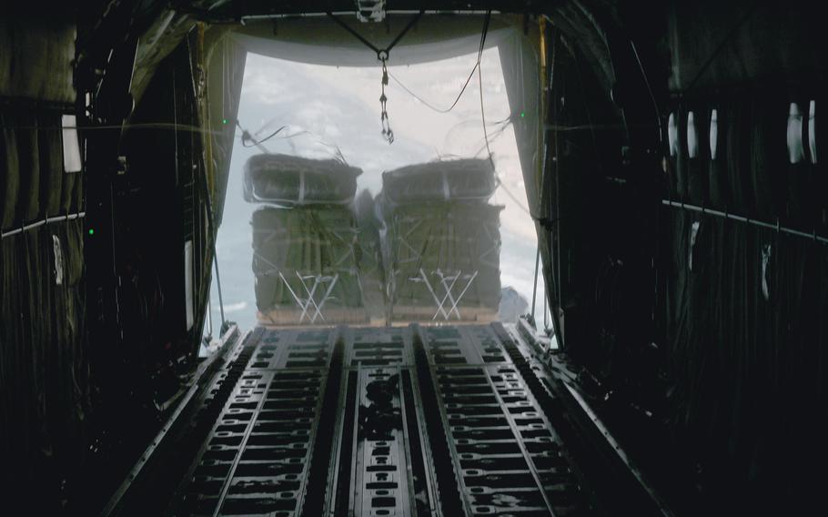 A U.S. Air Force C-130J Super Hercules conducts an airdrop of humanitarian assistance over Gaza, March 2, 2024. 