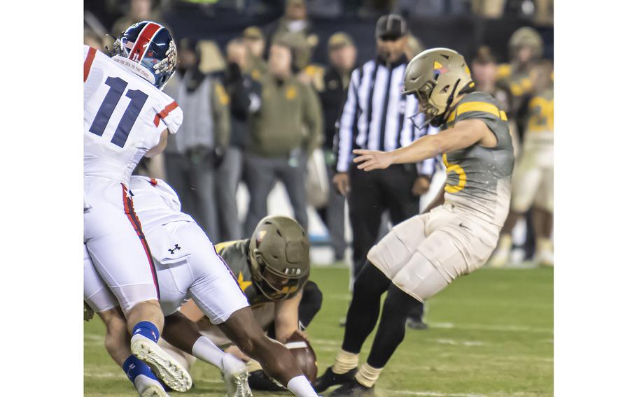 Army Academy kicker Quinn Maretzki kicks the winning field goal during the Army-Navy football game played at Philadelphia’s Lincoln Financial Field stadium on Dec. 10, 2022. Army won 20-17 in double overtime.