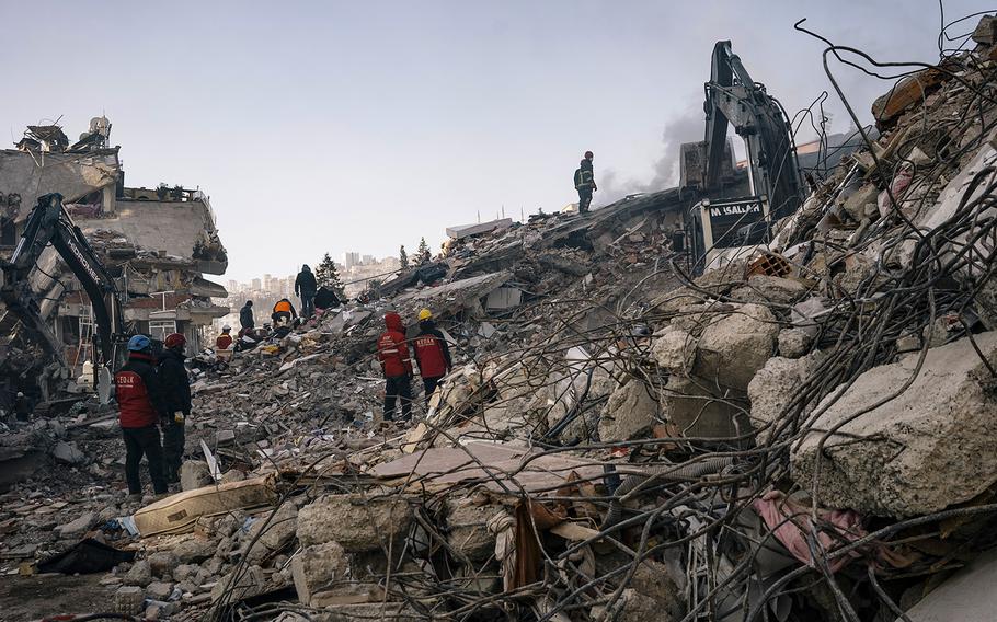 Rescue teams search through the rubble in Kahramanmaras, Turkey, on Thursday, Feb. 9, 2023.
