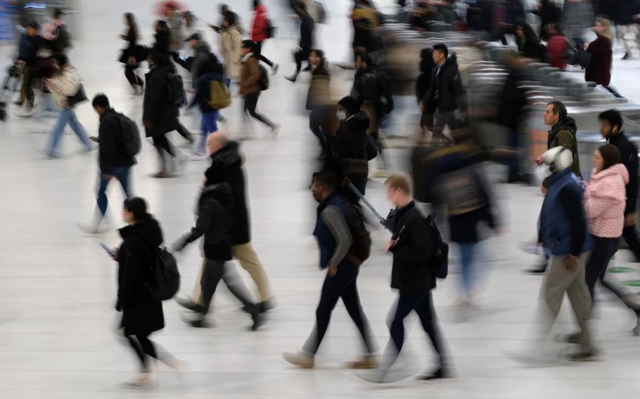 Commuters arrive into the Oculus station and mall in Manhattan on Nov. 17, 2022, in New York City.