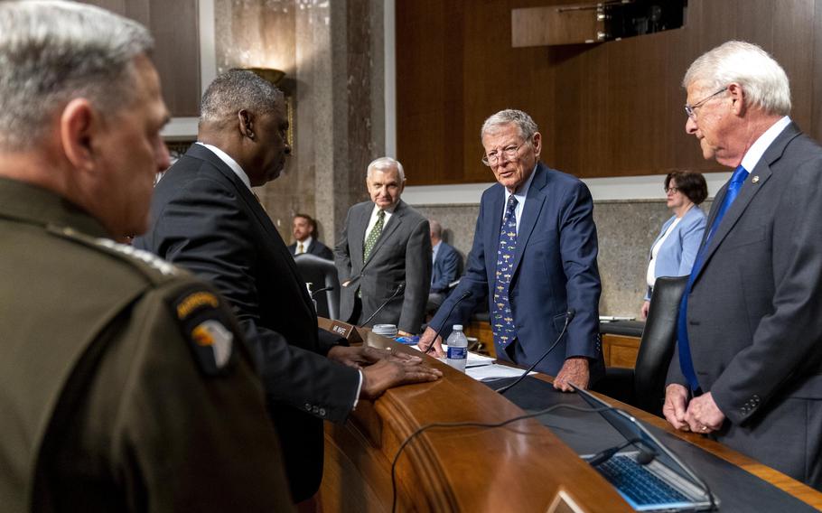 From left, Chairman of the Joint Chiefs of Staff Gen. Mark Milley, Secretary of Defense Lloyd Austin, Chairman, Jack Reed, D-R.I., Ranking Member Sen. James Inhofe, R-Okla., and Sen. Roger Wicker, R-Miss., speak before a Senate Armed Services budget hearing on Capitol Hill in Washington, Thursday, June 10, 2021. 