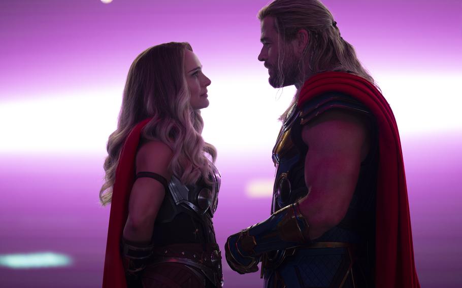 Natalie Portman, left, and Chris Hemsworth are both Thor in “Thor: Love and Thunder,” now playing in select AAFES theaters. 