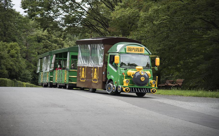 A tram carries people around the sprawling Showa Memorial Park in Tachikawa, Japan, Tuesday, July 27, 2021.