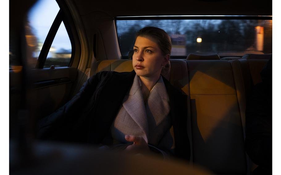 Olha Stefanishyna sits inside her diplomatic car while on her way to a meeting.