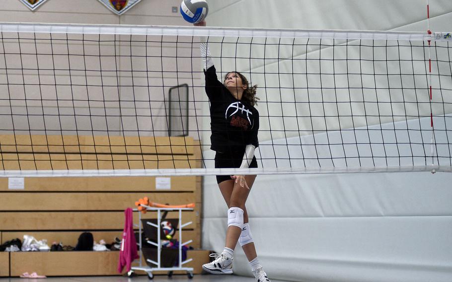 Dariana Luna hits the ball.