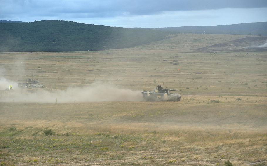A Hungarian Lynx infantry fighting vehicle goes on the offensive during an exercise. 