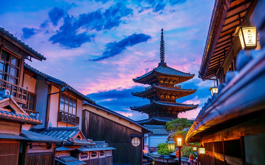 Blue and purple clouds form above Yasaka Pagoda during sunset in Kyoto, Japan, May 28, 2025. 