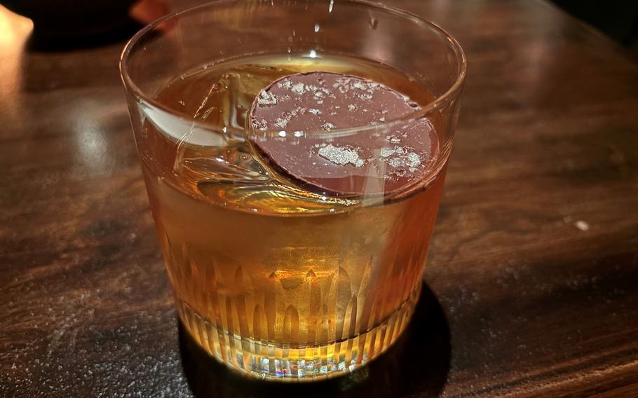 The Black Cat closely resembles an old fashioned, made with Laphroaig whisky, Japanese rum, plum wine and Okinawa sugar.