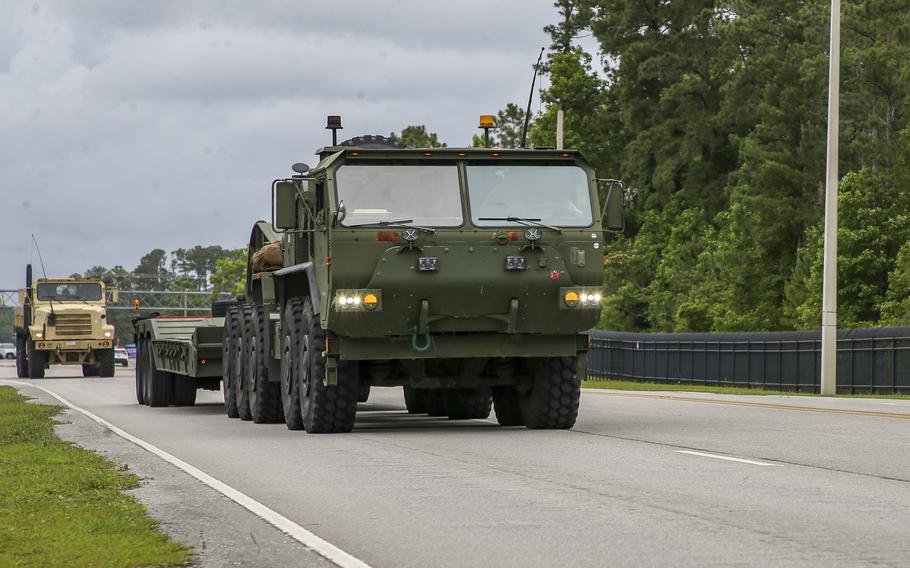 U.S. Marines drive onto Camp Lejeune, N.C., June 3, 2021. Marines with 2nd Transportation Battalion, Combat Logistics Regiment 2, 2nd Marine Logistics Group conducted a convoy across the U.S., one of the longest convoys in recent Marine Corps history.